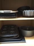 Various baking sheets and pans. 