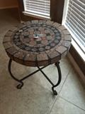 Beautiful stone wrought iron table. 