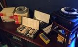 Slide projector and several carousels and lots of slides. 