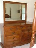Dresser with attached mirror
