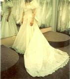 Size 8 silk, beaded wedding gown, never worn, new in preservation box