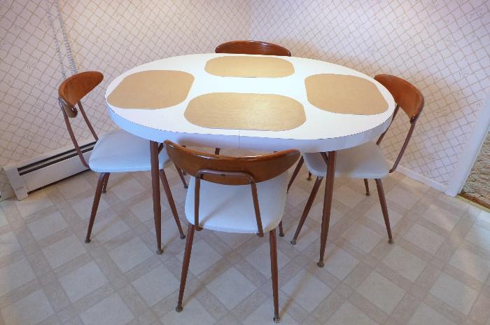 Danish Mid-Century Modern!  Comes with leaf! (not shown)  48" by 36" as shown.  12-inch leaf extension brings this table to 60 inches long!