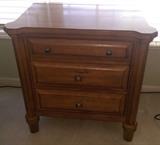 Unusual three drawer cabinet with built in electric for laptop size computer.