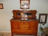 Antique sideboard with mirrored splash back