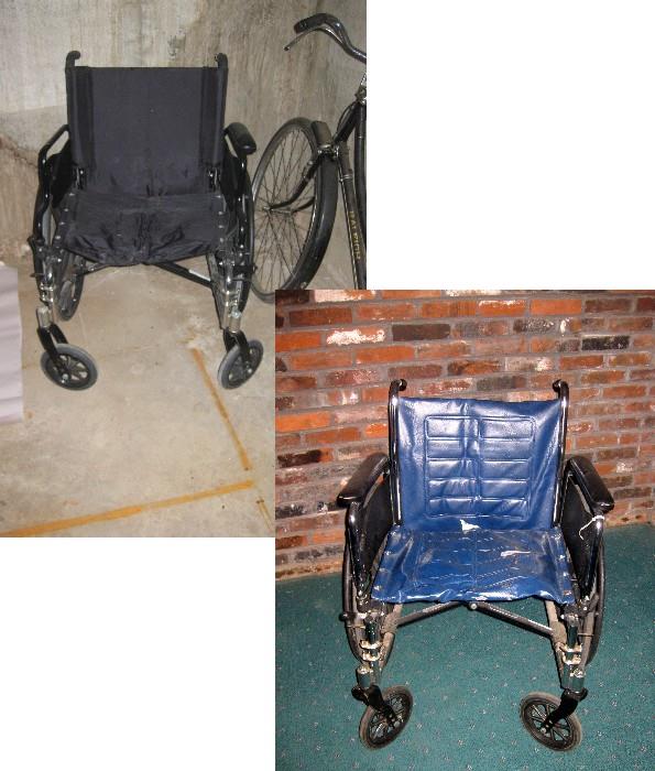 Two fold up wheelchairs