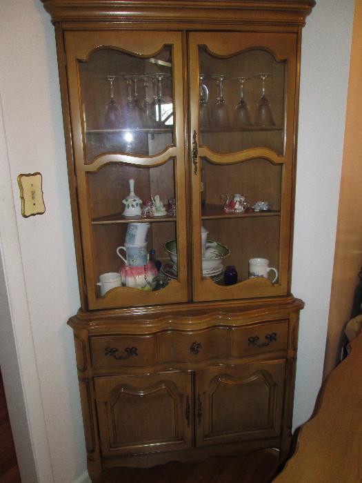 Beautiful corner cabinet and part of a 7-pc. Dining Room Suite