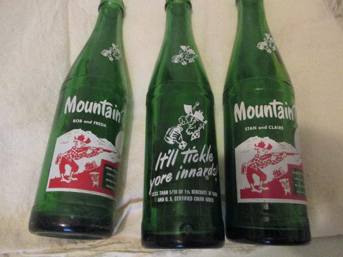 Vintage Mountain Dew glass pop bottles.  Notice the names on these: Bob and Freda  and  Stan and Claire.