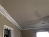 Crown molding, can be removed, as well as all door trim and curtain rods. 