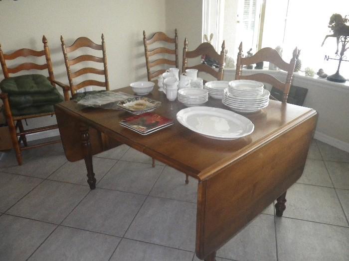 Solid wood table, 2 leaves, drop leaf, pads and ladderback chairs