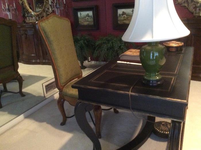 A lovely writing table or desk, in black with gold trim. The desk chair is elegant and makes a good pull up or side chair.