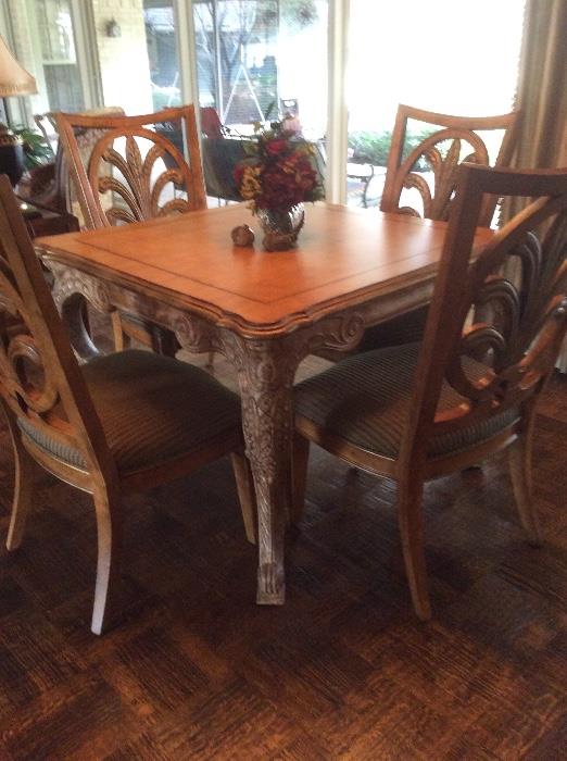 Oo lala! Look at this elegant game/card table and chairs! Could also be a perfect size for a breakfast room or apartment.