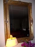 One of a large assortment of beautifully elegant wall mirrors