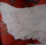 Close up detail of beautiful crocheted round pineapple pattern tablecloth