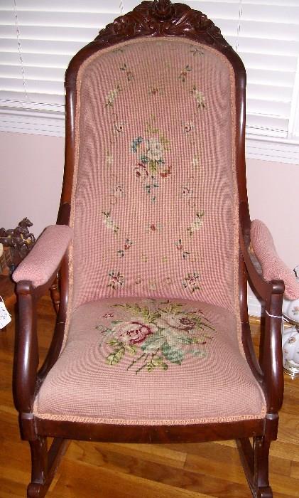 Beautiful needlepoint on carved Victorian rocking chair