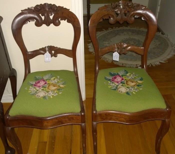 Beautiful pair of Victorian heavily carved side chairs - needlepoint is in immaculate condition