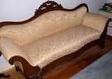 Upholstered Victorian mahogany sofa