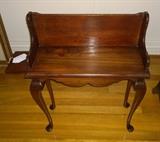 Mahogany chair side book rack with pull out shelf