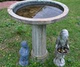 Classic style concrete bird bath and yard figurines