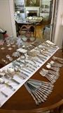 Very nice silver plate flatware - pickle forks, lemon forks, cocktail forks, cake servers and more. Also 12 three piece place settings plus extras of Alvin "Chateau Rose" sterling silver flatware