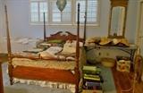 Beautiful mahogany 4 poster bed, more linens, another mirror