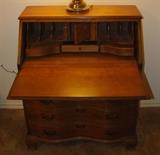 Antique Secretary with Locking Drop-leaf shelf and four curved front drawers. 30x15x38-1/2