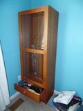 Gun cabinet and supplies.