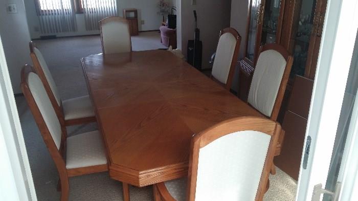 Dinning table seating for 6, extended leaf, table comes with multiple linens, table pad, and chair covers. $750