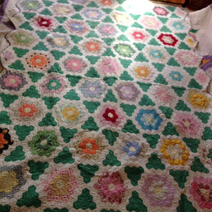 Fantastic Grandmothers Flower Garden is quilted beautifully, great colors and a heavy quilt.