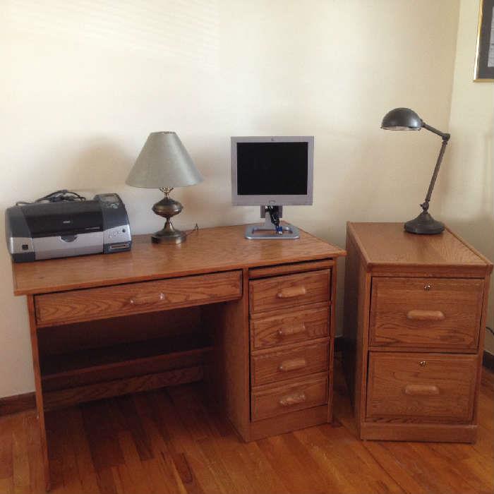 Solid Oak desk $150 and file cabinet $75 along with a printer and monitor