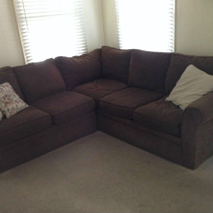Brown fabric sectional from Gorman's $300. All cushions are separate and reversible