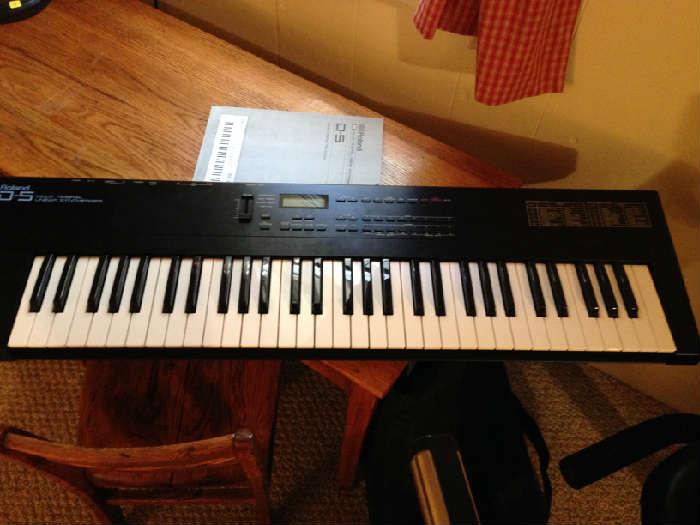 Roland Professional electric Keyboard with case and stand 