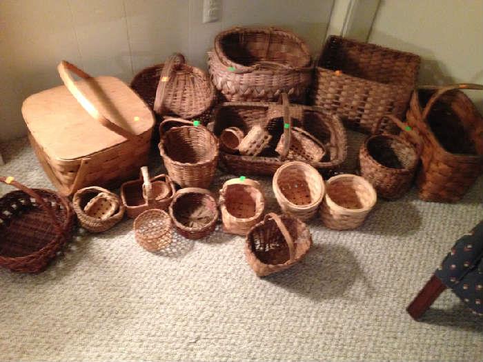 Collection of baskets. Square one in top of picture is an Indian potato basket. Lots of nice small baskets.