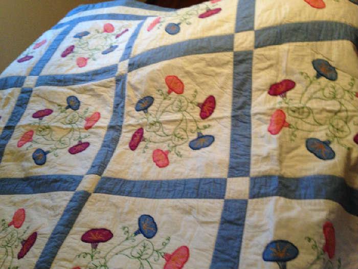 Beautiful appliqued and quilted piece. Nice vibrant colors
