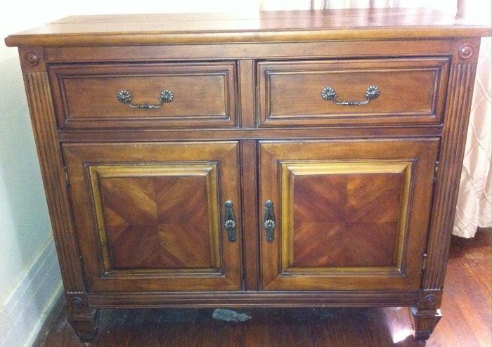Walnut buffet---front half of top lifts up to reveal lined compartment for silverware.