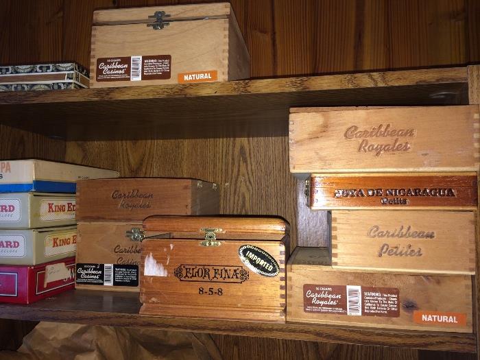 Vintage cigar boxes--wooden and cardboard.