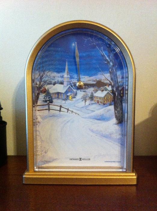 Howard Miller clock with winter scene.