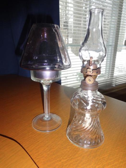 A pair of glass oil lamps
