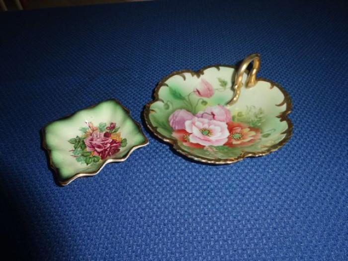 A pair of decorative floral serveware plates.
