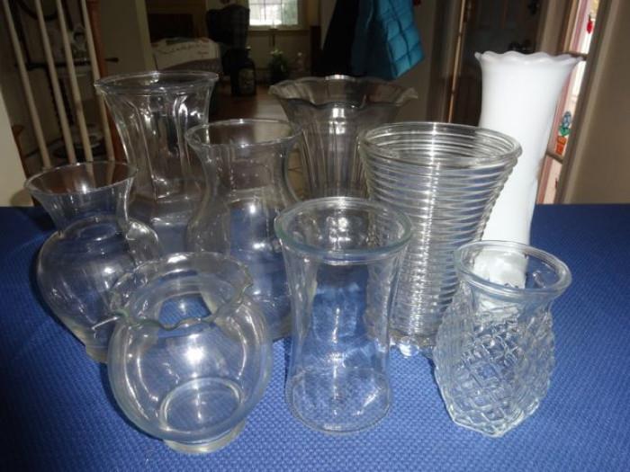 Various glass pitchers and vases.