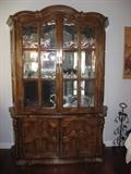 lighted china cabinet with beveled glass panels, glass shelves
