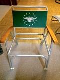 Captain's chair with aluminum frame and wooden arms