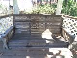 Wooden porch swing