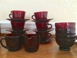 Anchor Hocking Royal Ruby sugar/creamer and cups/saucers (one cup is chipped) plus four berry bowls (one has been repaired)