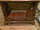 TV cabinet emptied of innards (there are four in the house of all different styles)