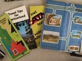 There are hundreds of travel brochures and maps--for Mexico, the Carribean, and Europe
