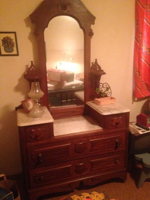 Eastlake antique dresser with marble top and mirror circa late 1800's