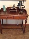 Antique writing desk, lamp, book ends