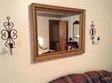 mirror and metal candle holders