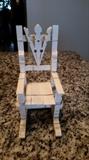 Unique tiny doll chair made of clothes pins