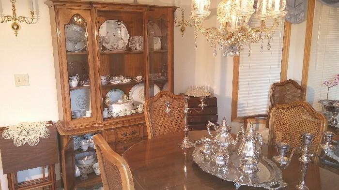 Curio cabinet and dining room table and 6 chairs